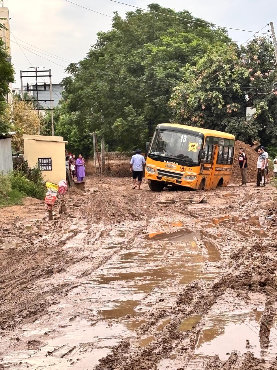 A school bus sank into a sewer line in Chhajju Majra area of Kharar, a major accident was averted, children were safely taken to their homes